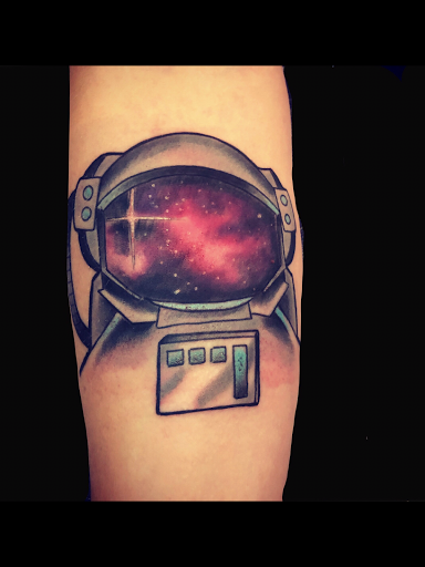 Explore tattoo ideas for men thigh, creative tattoo ideas in Addison, available at Cat Tattoo