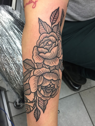 Explore african american tattoo ideas, creative tattoo ideas in Ozone Park, available at Rebel Ink Tattoo & Piercing
