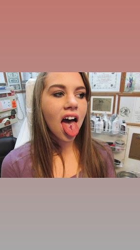Explore woman side tattoo ideas, creative tattoo ideas in Elko, available at Custom Tattoos and Body Piercing Studio