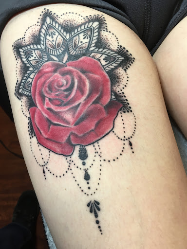 Find family tattoo ideas for moms for your next unique tattoo in Coldwater at Relevant Tattoo and Piercing