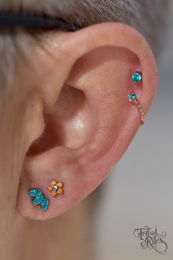 Explore skull neck tattoo ideas, creative tattoo ideas in Fort Collins, available at Tribal Rites Tattoo & Piercing