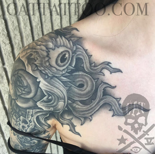 Explore ribcage tattoo ideas, creative tattoo ideas in Addison, available at Cat Tattoo