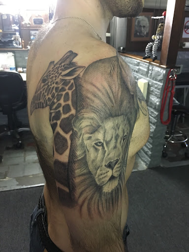 Explore 1975 tattoo ideas, creative tattoo ideas in Philadelphia, available at Tattoo Odyssey Inc