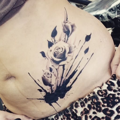 Explore cute face tattoo ideas, creative tattoo ideas in Chicago, available at Royal Flesh Tattoo and Piercing