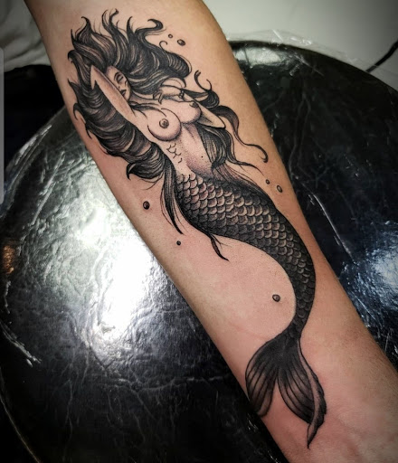 Explore ed hardy tattoo ideas, creative tattoo ideas in Millsboro, available at Tattoo Galaxy (Millsboro) Piercing & Custom tattoos