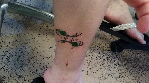 Explore rock and roll tattoo ideas, creative tattoo ideas in Montrose, available at Precision Art Tattoo & Body Piercing