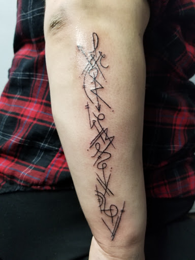 Explore glow in the dark tattoo ideas, creative tattoo ideas in Arcade, available at 98 South Tattoo and Piercing