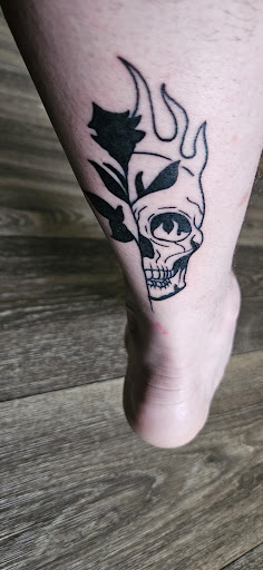 Explore snake tattoo ideas for females, creative tattoo ideas in Fayetteville, available at Sacred Raven Tattoo Shop