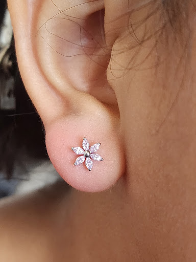 Explore color flower tattoo ideas, creative tattoo ideas in Cary, available at EL ZORRO TATTOO and piercing