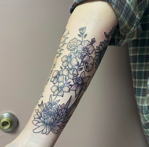 Explore dog nose print tattoo ideas, creative tattoo ideas in Kenosha, available at Kenosha Tattoo Company