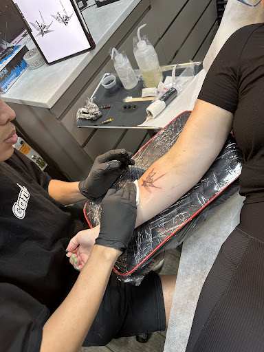 Explore tattoo ideas from books, creative tattoo ideas in Buford, available at Wild Tribe Tattoos and Piercings