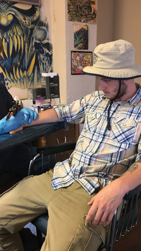 Explore urban tattoo ideas for men, creative tattoo ideas in Dayton, available at Private Ink Tattoo Studio