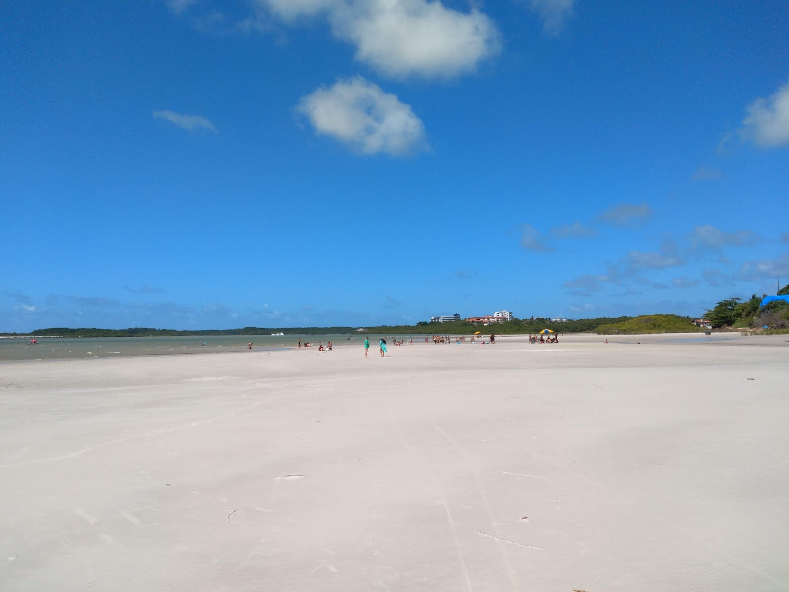 Foto di Praia do Macarico con una superficie del sabbia beige
