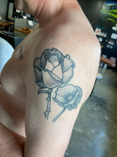 Explore book tattoo ideas for females, creative tattoo ideas in Zumbrota, available at Art by Sinclair Tattoo Artist At Dry Bones Ink