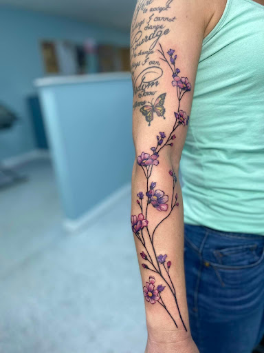 Explore tattoo ideas for your legs, creative tattoo ideas in Ocala, available at Beauty in a Canvas Tattoo and Art Gallery