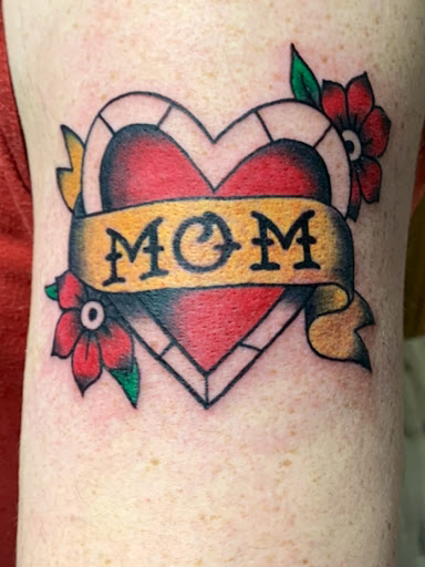 Explore memorial cross tattoo ideas, creative tattoo ideas in Warren, available at Inkognito Tattoo