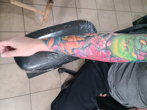 Explore japanese snake tattoo ideas, creative tattoo ideas in Omaha, available at LeVeL UP Tattoo