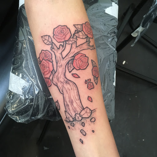 Explore sleeve tattoo ideas for women, creative tattoo ideas in Carbondale, available at Bonedale Tattoo
