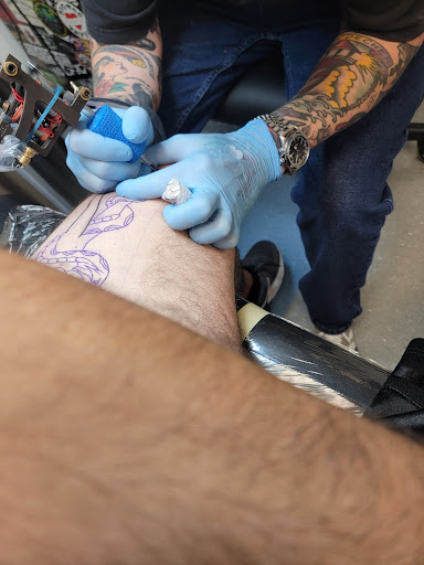 Explore red tattoo ideas women, creative tattoo ideas in Brookfield, available at Hat City Tattoo