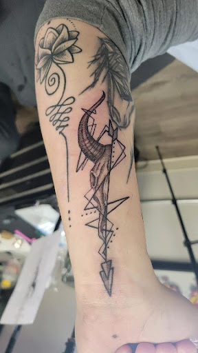 Explore area code tattoo ideas, creative tattoo ideas in Omaha, available at Grinn & Barrett Tattoo