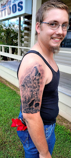 Explore hand tattoo ideas for men, creative tattoo ideas in Conway, available at Primal Urge Tattoos