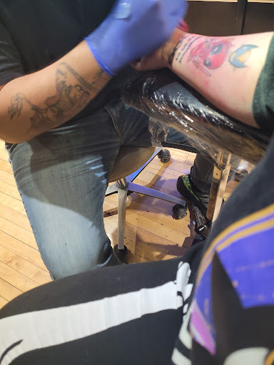 Explore kneecap tattoo ideas, creative tattoo ideas in Chicago, available at Archer Avenue Tattoo & Body Piercing