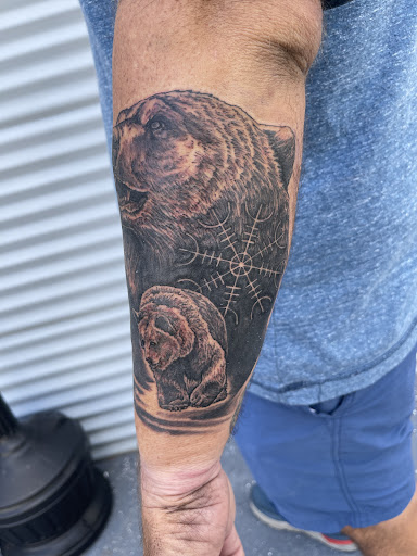 Explore vertical tattoo ideas, creative tattoo ideas in Myrtle Beach, available at Elite Ink Tattoos of Myrtle Beach