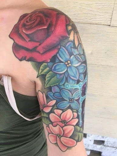 Explore ripped skin tattoo ideas, creative tattoo ideas in Port Orange, available at Electric Shark Tattoo Studio