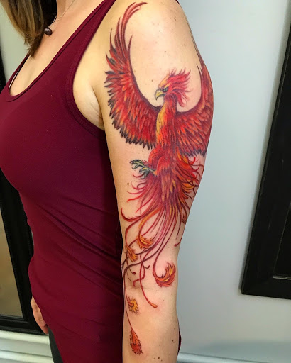 Explore rock and roll tattoo ideas, creative tattoo ideas in Raleigh, available at Mad Ethels Tattoo & Body Piercing