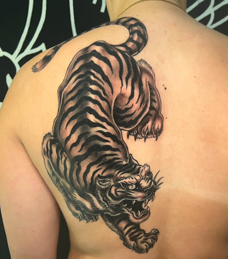 Explore mens behind ear tattoo ideas, creative tattoo ideas in Springfield, available at Infinium Studios - Tattoos & Piercings