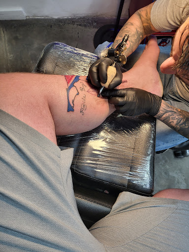 Explore sheet music tattoo ideas, creative tattoo ideas in Cocoa Beach, available at The Corner Tattoo and Piercing Studio