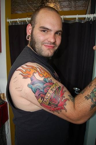 Explore cross tattoos ideas, creative tattoo ideas in Fort Wayne, available at Cardinal Tattoo & Piercing