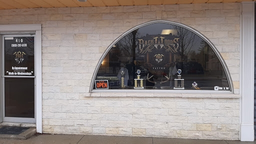 Explore bottom leg tattoo ideas, creative tattoo ideas in Lakeview, available at Backwoods Tattoo Studio