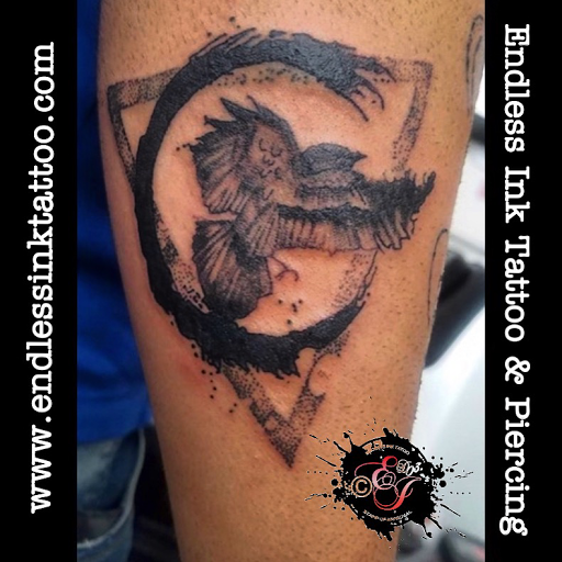 Explore wedding ring tattoo ideas for men, creative tattoo ideas in Denver, available at Endless Ink Tattoo & Piercing