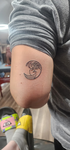 Explore atlantis tattoo ideas, creative tattoo ideas in Sayville, available at Dark Timez Tattoo and Piercing