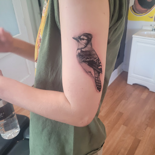 Explore tattoo ideas behind the ear tattoos, creative tattoo ideas in Milwaukee, available at The Skin Museum