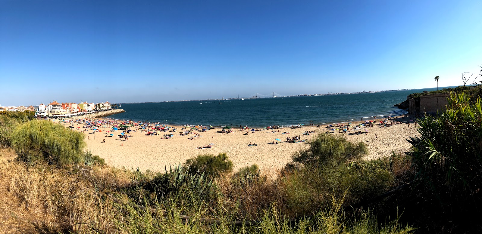 Foto de Playa de la Muralla com baía espaçosa