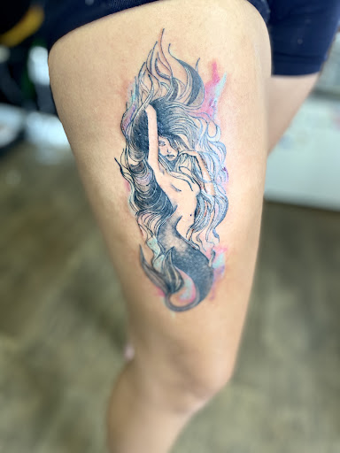 Explore godson tattoo ideas, creative tattoo ideas in Lake City, available at Crooked Spines Tattoo Studio