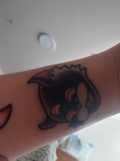Explore one piece tattoo idea, creative tattoo ideas in Camp Hill, available at Camp Hill Collective Tattoo and PMU