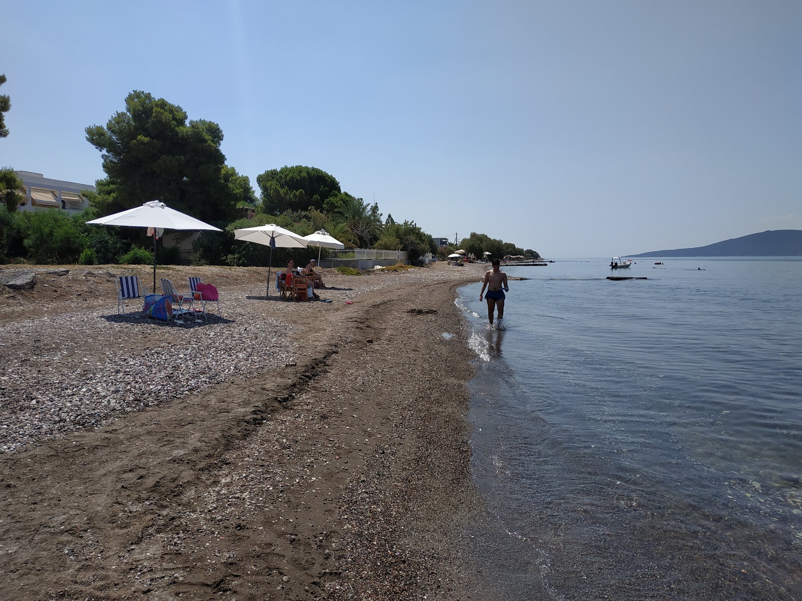 Foto von IRIA BEACH mit schwarzer sand & kiesel Oberfläche