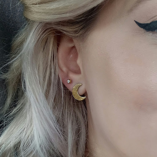 Explore men's side neck tattoo ideas, creative tattoo ideas in Orange, available at The Piercing Shop