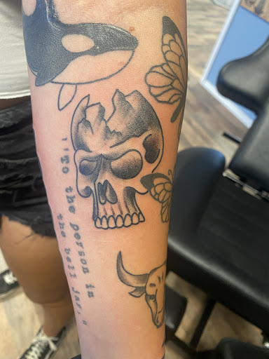 Explore name tattoo ideas on neck, creative tattoo ideas in Seymour, available at 3 Sevens Tattoo