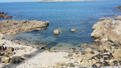 Praia de Lino'in fotoğrafı geniş bir kıyı şeridi ile birlikte