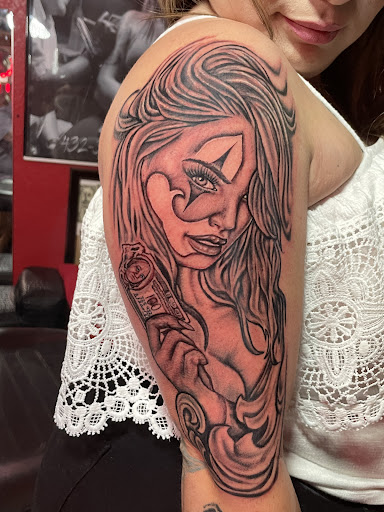 Explore snake tattoo ideas for guys, creative tattoo ideas in Midland, available at The Company Ink