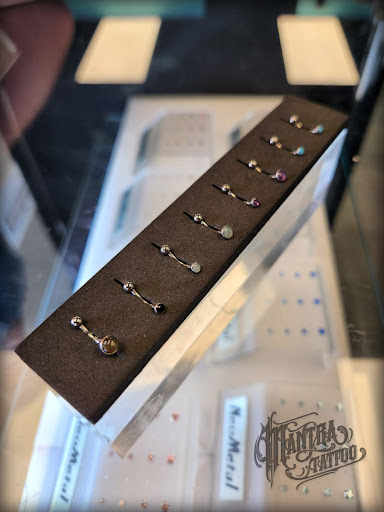 Explore nfl tattoo ideas, creative tattoo ideas in Denver, available at Mantra Tattoo and Piercing