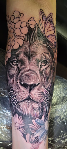 Explore dad tattoo ideas for men, creative tattoo ideas in Angola, available at Hoodlum Ink