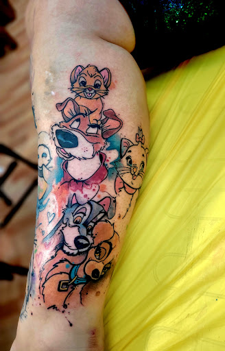 Explore butterfly arm tattoo ideas, creative tattoo ideas in Benton, available at Spectrum Tattoo