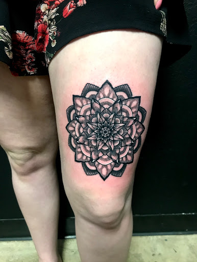 Explore wrestling tattoo ideas, creative tattoo ideas in Mesa, available at Next Wave Tattoos and Piercings 2