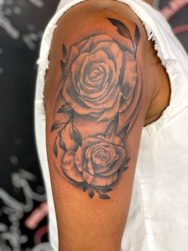 Explore statue tattoo ideas, creative tattoo ideas in Denver, available at Endless Ink Tattoo & Piercing