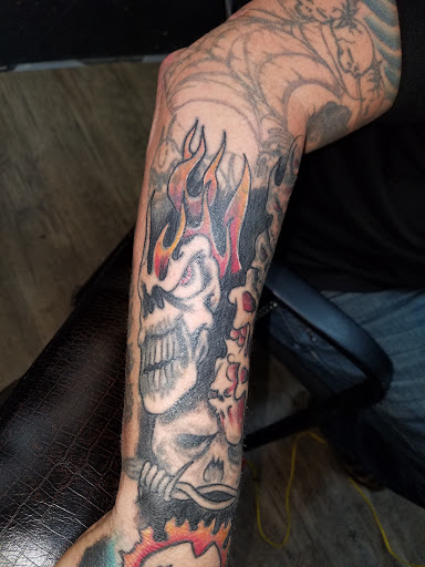 Explore tattoo word cover up ideas, creative tattoo ideas in Frankfort, available at AMaysing Ink Tattoos and Piercings